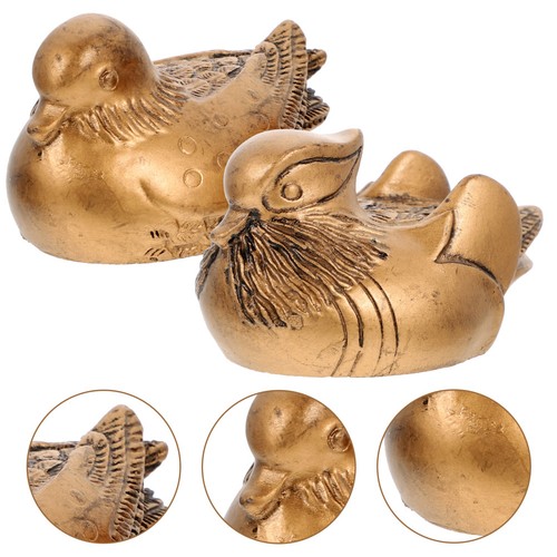 Paire statue de - de, canard