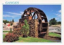 34 GANGES A PADDLE WHEEL GRINDER FOR CROP IRRIGATION