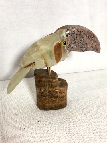 Toucan pierre sculptée - en,