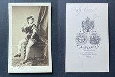 Numa Blanc, Paris, Sylvia, actress in stage costume with a cup of Champag