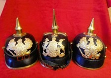 Reproduction of three German pointed helmets