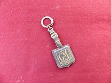 Ancien porte clé cuir et métal  : GM général motors