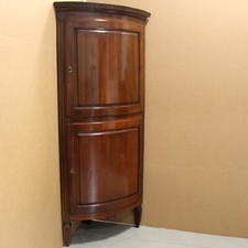 Encoignure galbée d'époque