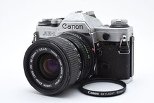 Appareil photo reflex argentique 35 mm DDP US Canon AE-1 avec objectif#106361...
