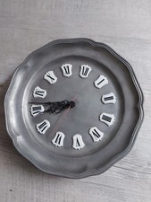 Horloge murale en étain