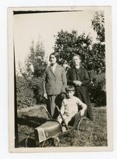 PHOTO Snapshot, in a garden pedal car vintage toy old car pedal