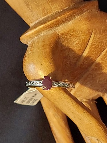 Goldtone and silvertone ruby - and,