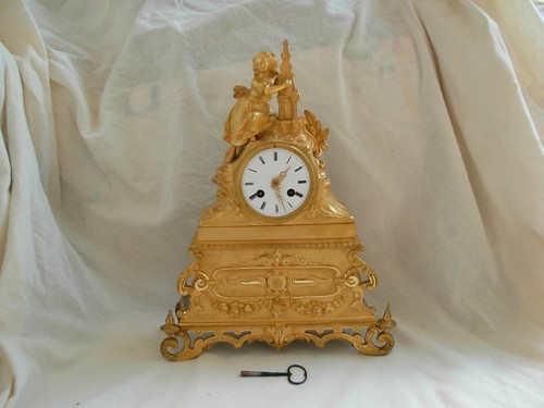 Pendule bronze - en,