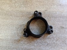 UN SUPPORT D ECHAPPEMENT BRIDE