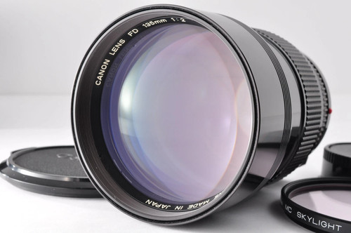 Canon new 135mm mint - canon,