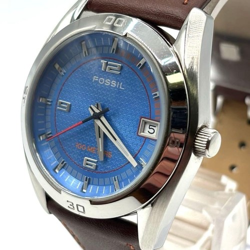 Montre quartz fossil - à,