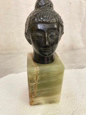 sculpture tête de divinité