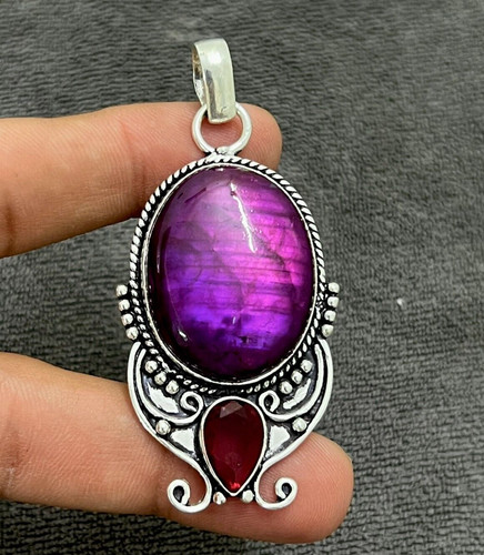 Pendentif bijou fait - , en