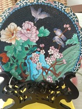 A large Japanese cloisonné charger decorated with birds on flower branches