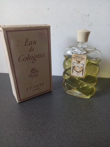 Ancien flacon jamais - ancien, ouvert