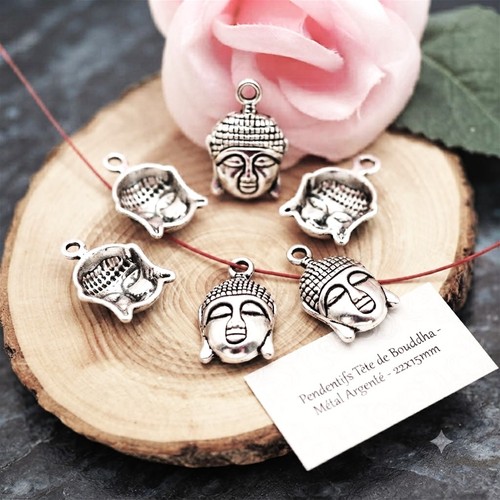Lot pendentifs tête de - 5,