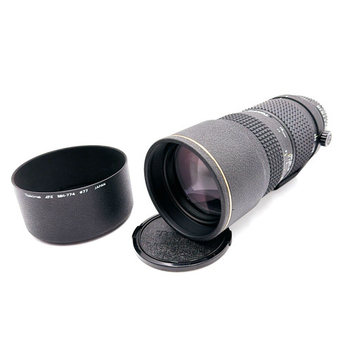 Top comme neuf objectif - [top, zoom