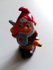 Kinder Surprise: Dwarf Stripping a Flower Figure