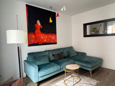 Canapé d’angle en velours en excellent état. Couleur Bleu Canard.