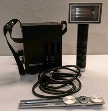 Metz 60 CT-4 Flash unit, sync cord, battery holder, strap - untested