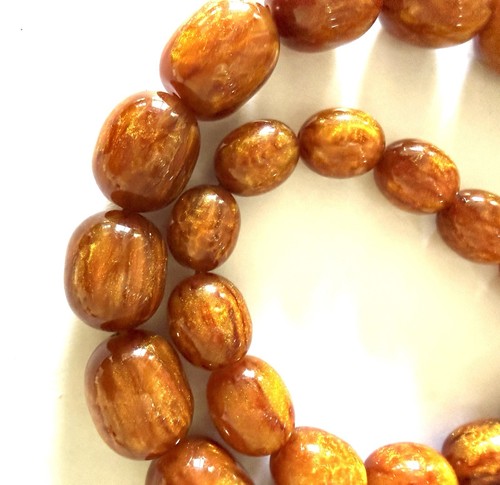 Collier perle lucite - 95,