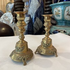 pair of bronze candle holders
