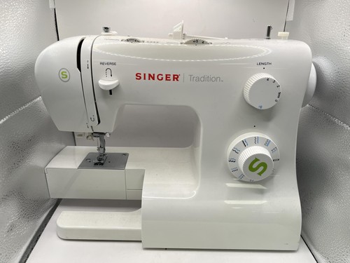Machine coudre singer - à,