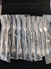9 fourchettes à 2 dents