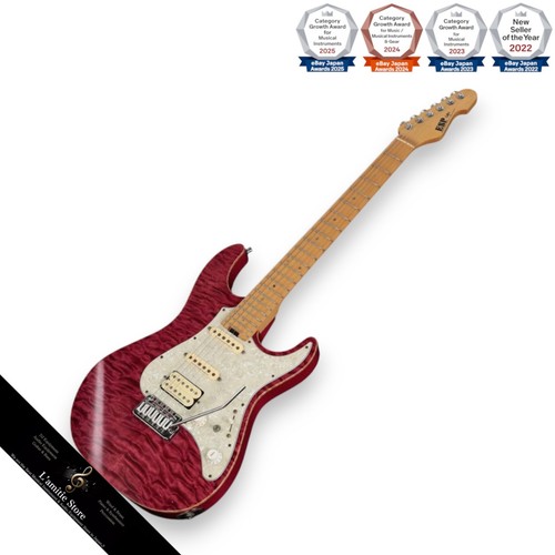 Guitare électrique magenta