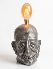 Lampe en etain visage homme