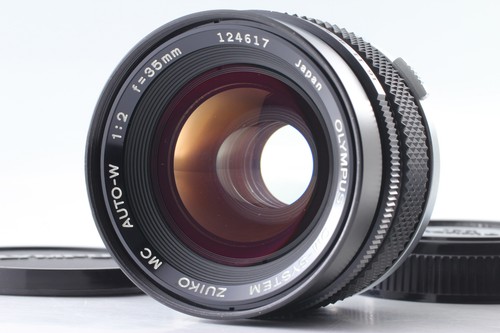 Presque comme neuf objectif - neuf*,