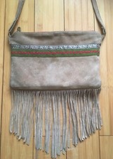 Suede fringe purse with adjustable strap by Nature Decouvertes 