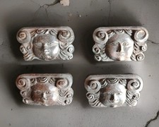 Pretty quartet of antique carved heads ornament of oak furniture