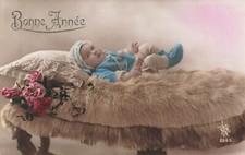 CP GOOD YEAR BABY HAT LYING ON FUR - ROSES