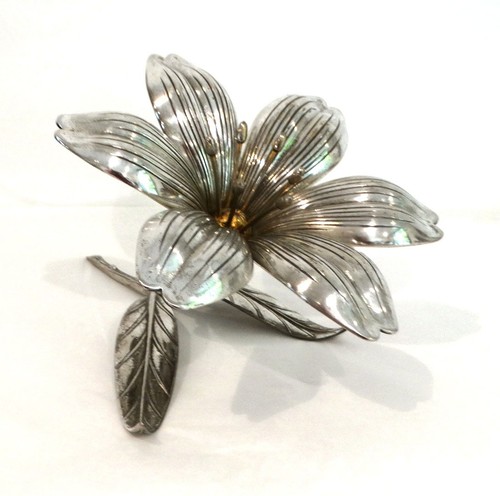 Fleur bronze argenté sur - en,