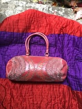 Pochette cuir brodé de perles
