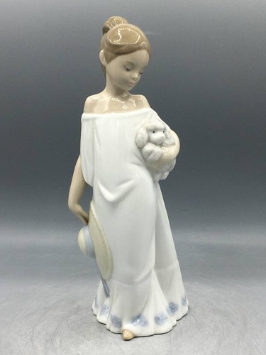 Figurine porcelaine fille - en,