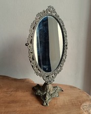 Patinated Metal Oval Swivel Stand Mirror