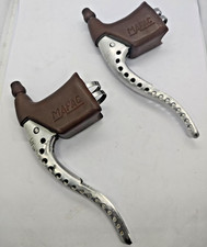 Manettes, Poignées, Leviers