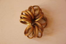 Antique curtain rings, gilded hollow brass.