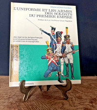 L'Uniforme et Les Armes des
