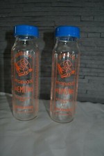 Lot de 2 biberons anciens