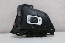 Boutons multifonctions volant