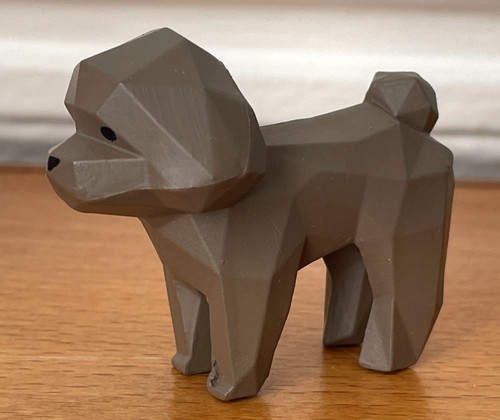 Figurine plastique façon - , bois