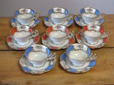8 tasses rococo en porcelaine