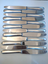 SUITE DE 12 COUTEAUX DE TABLE