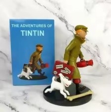 FIGURINE: TINTIN AVEC UNE