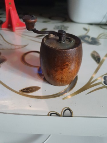 Old wooden pepper mill - pepper,