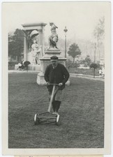 Gardener mowing the Tuileries grass. Paris. craft.