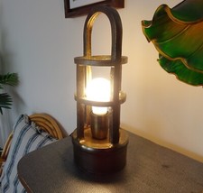 Lampe en métal couleur bronze. Occasion récente en TBE